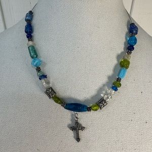 Blue and green glass bead necklace floating cross